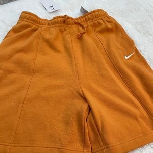 Orange loose fit Nike shorts